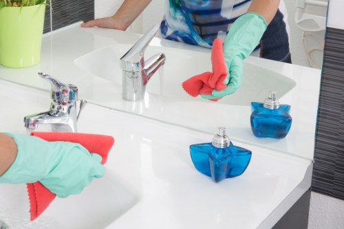 Local oven cleaner working in a Bermondsey flat kitchen