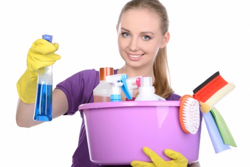 Local cleaner handling a Bermondsey short-let bathroom reset